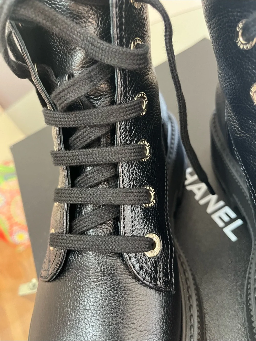 CHANEL Black Leather Lace-Up Platform Ankle Boots with Gold Logo